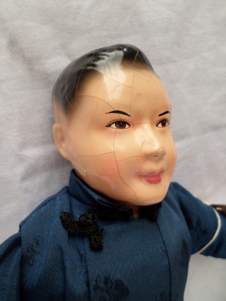 Oriental pot headed doll dressed in traditional dark blue costume - Image 2 of 2