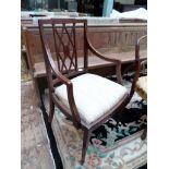 Inlaid mahogany armchair with decorative rectangular splat to back the loose padded seat