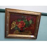 Gilt framed still life oil on board of a bowl of pansies