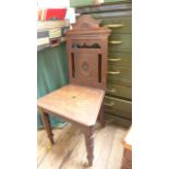 Carved oak hall chair