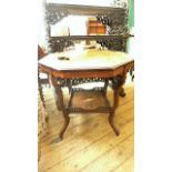 Inlaid octagonal topped occasional table on four shaped splayed feet united by rectangular