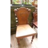 Larger shaped backed oak hall chair