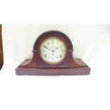 An enamel dialed mantelclock in rosewood dial hooded case ex.