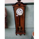 Vienna wall clock in rectangular mixed wood case, brass pendulum, single weight,