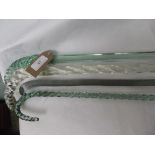 4 green glass walking sticks