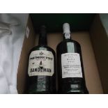 Almeida's bottle of dry white port and a bottle of Sandemans Partners fine Old Ruby Vintage port