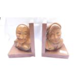 Pair of bookends carved elderly lady and gentleman