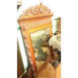 Fine carved over mantel in the Black Forest style, inset rectangular bevel edged mirror,