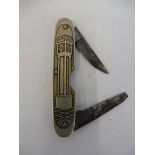 A rare B.V.Benzol - B.V.Aral penknife with a petrol pump detail inscription.