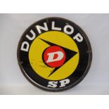 A Dunlop SP circular double sided enamel sign in a tubular metal frame, 30" diameter overall.