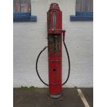 A Hammond Model F hand operated 'lighthouse' petrol pump with hose and correct Hammond bronze