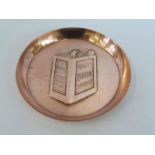 A Pratts advertising copper ashtray.