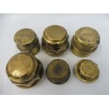 Six assorted brass wagon hub nuts including Henry Eaton of Manchester, Frederick Sharpe of Rugby