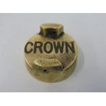 A Crown petrol can cap.