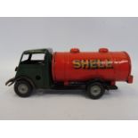 A Minic Toys clockwork tinplate Shell Petrol tanker.