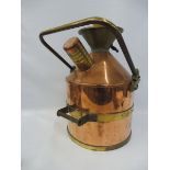 A Wragg Bros. Ltd. of Wickford Essex copper and brass mounted four gallon measure, no. 7331.
