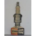 A Champion Spark Plug pictorial die-cut showcard, 18 x 45".