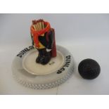 A Dunlop Tyres ceramic golfer matchstriker ashtray with detachable golf ball head, signed by