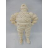 A plastic Michelin standing figure of Mr. Bibendum.