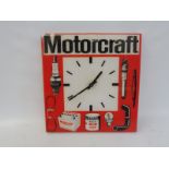 A Motorcraft plastic showroom clock, 15 x 15 3/4".