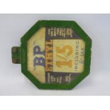 A Shell-Mex & BP Ltd. octagonal petrol pump price tag with reproduction paper insert.