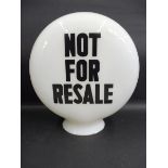 A Not for Resale glass petrol pump globe in good condition.