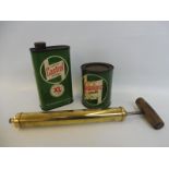 A Castrolease grease tin, a Castrol motor oil can and a brass grease pump gun.