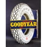 A Goodyear tyre-shaped double sided enamel sign with hanging flange, in excellent condition, 22 x