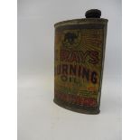 An X Rays Burning Oil oval can by The Elephant Chemical Co. Ltd.