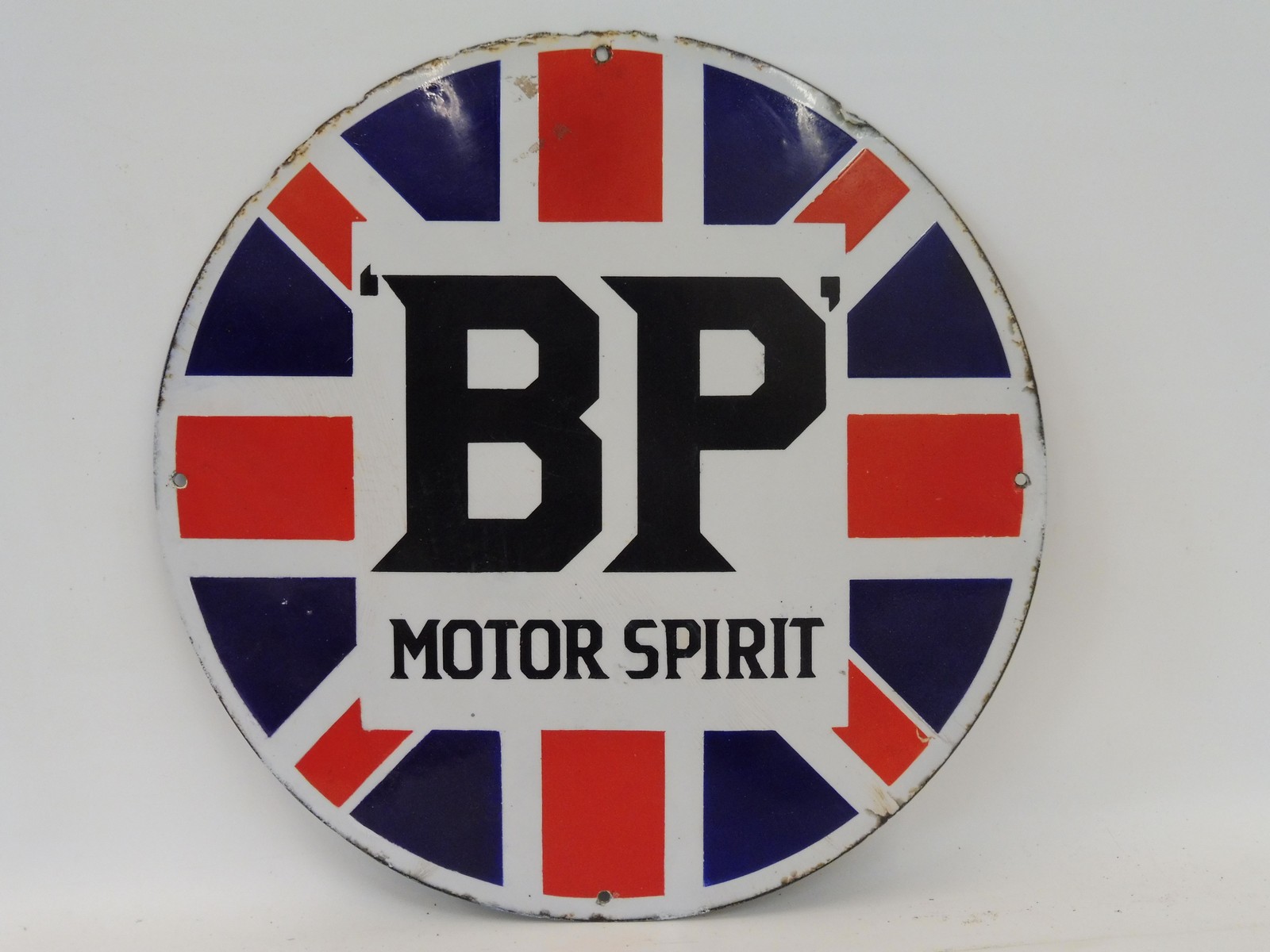 A good BP Motor Spirit Union Jack enamel sign of rare circular size, some professional