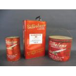 A Silkolene Classsic Lubricants gallon can with contents, a Silkolene grease tin and an empty