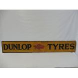 A Dunlop Tyres three piece tin advertising sign, in good condition, 73 x 11 1/2".