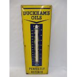 A Duckham's Oil enamel thermometer, broken tube, 13 x 36".