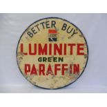 A Regent Luminite Green Paraffin circular aluminium advertising sign, 32 " diameter.