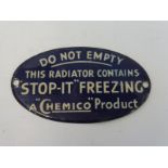 A Chemico 'Stop-It' Freezing oval tin plaque 'Do Not Empty', 4 1/4 x 2 1/2".