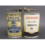 An Excelene Cycle Lubricating Oil oval can and one other.