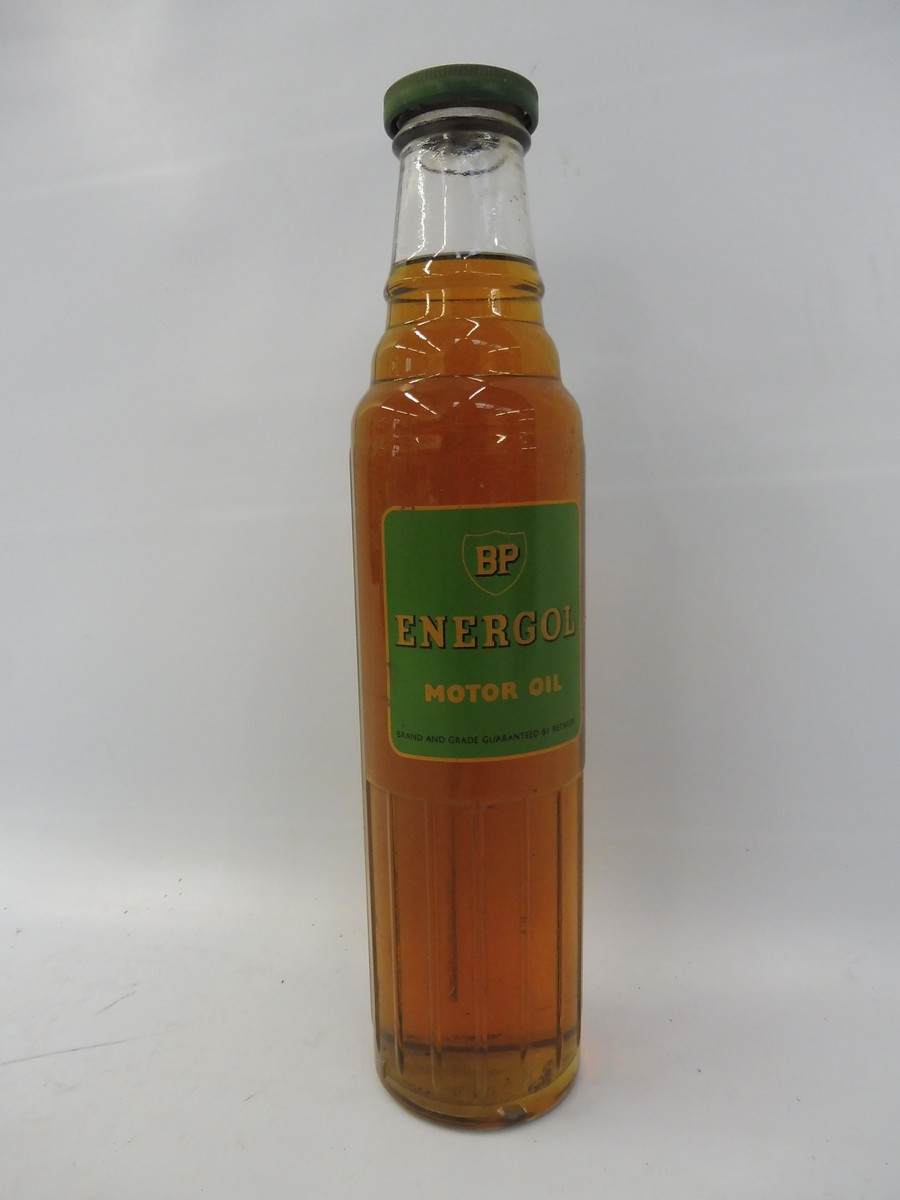 A BP Energol Motor Oil glass bottle with contents.
