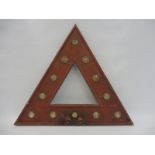 A triangular warning sign inset with clear reflective discs, 17 3/4 x 15 1/2".