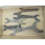 A small group of motorcycle spanners including New Hudson, Enfield etc.