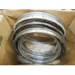 Five motorcycle rims, new old stock.