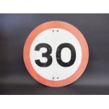 A 30mph circular road sign, 23 1/2" diameter.