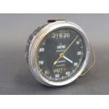 A Smiths 0-80mph chronometric black faced speedometer.