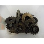 A quantity of motorcycle sprockets including BSA.