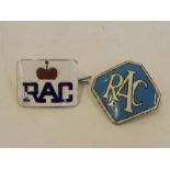 Two small RAC cap badges.