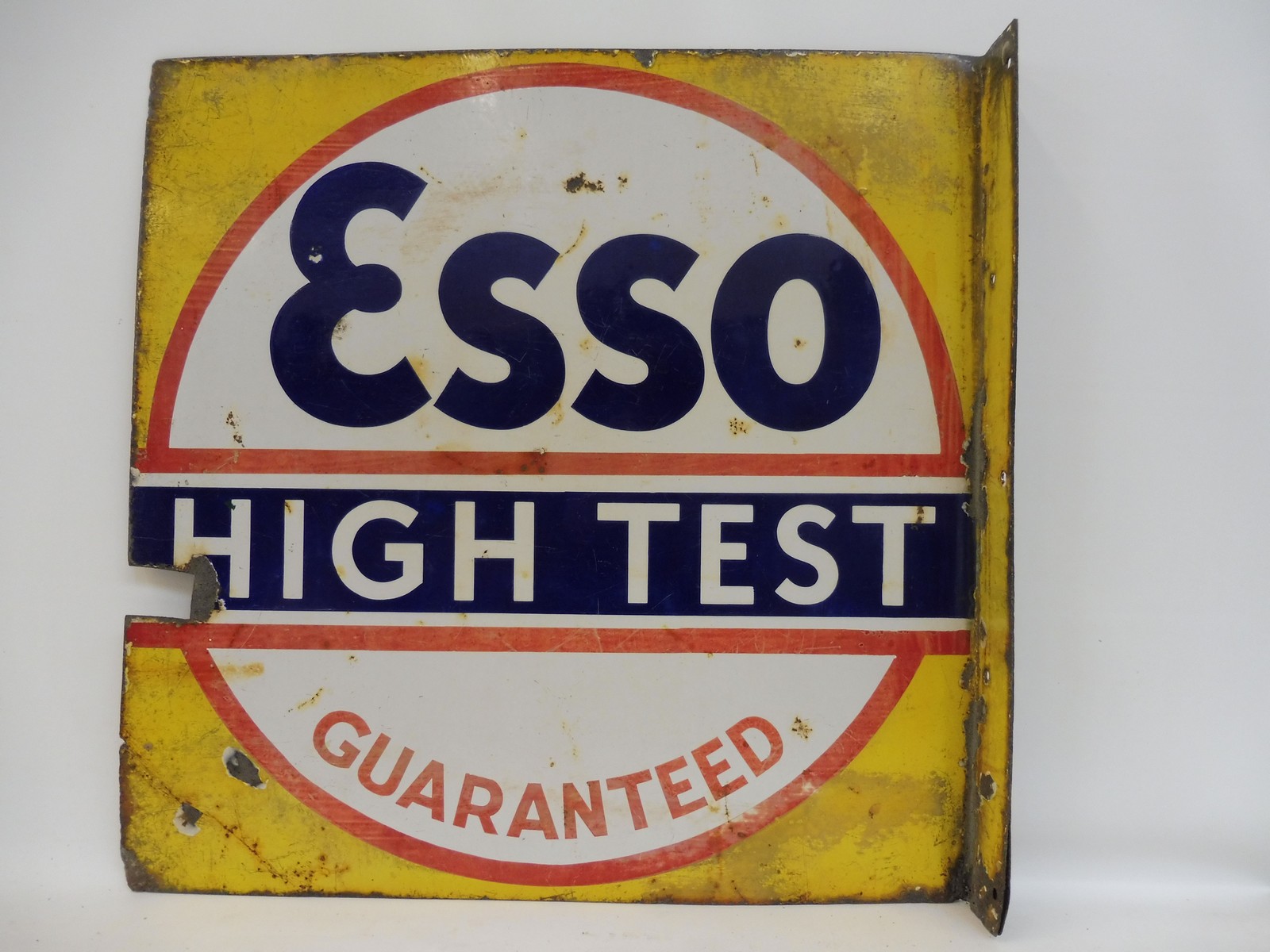 An Esso High-Test Guaranteed double sided enamel sign with hanging flange, 22 x 22".