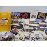 A box of Honda Motorcycle brochures.