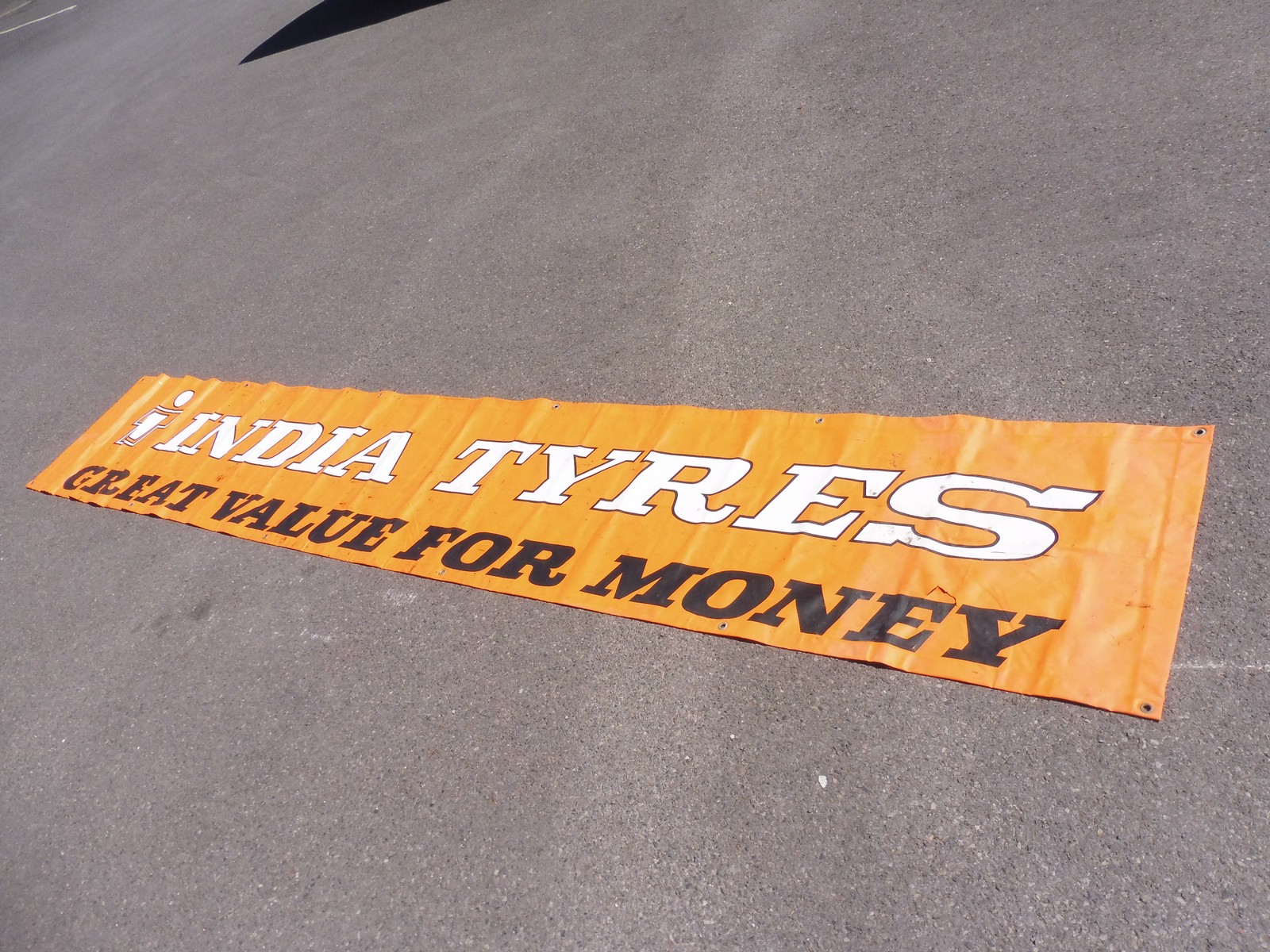 An India Tyres banner, 128 3/4 x 21 1/2".