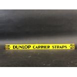 A Dunlop Carrier Straps shelf strip in good condition.