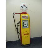 An Avery Hardoll Model 598 petrol pump, professionally restored, complete with hose, nozzle and a