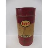 An Esso grease drum of large size.